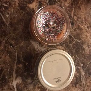 Two homemade cinnamon sugar candles.